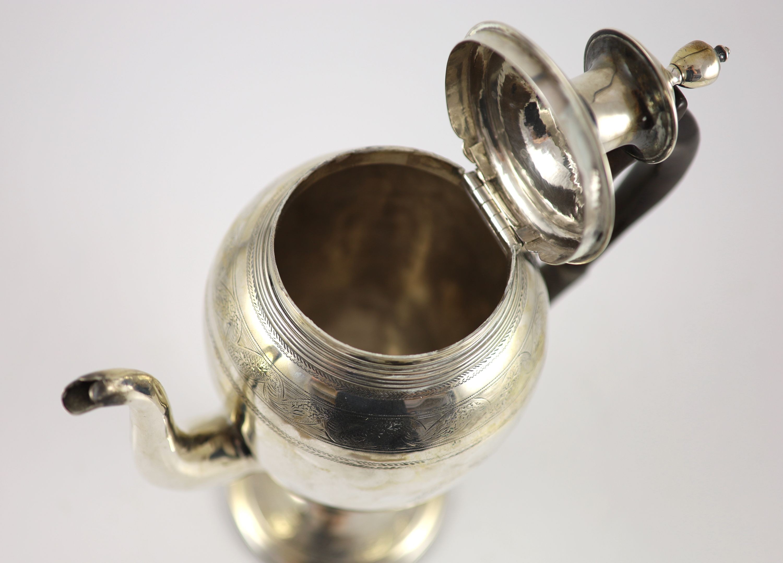 A George III provincial silver pedestal coffee pot with hinged cover, by John Robertson I